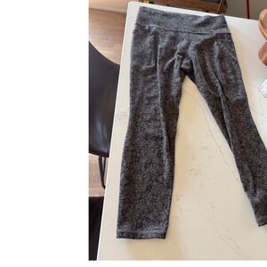 Athleta Salutation Stash Pocket II 7/8 Tight Womens Medium Brown Black Print